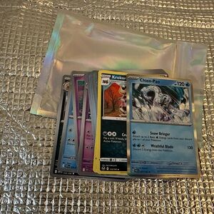 Collection of 30 Pokémon trading cards. Includes various cards/vibrant designs.